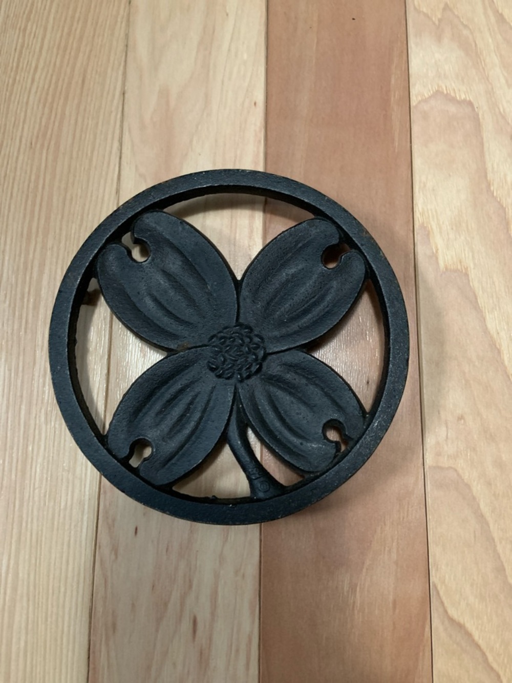 H. Burns Dogwood Cast Iron Trivet